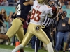 December 29 2011: Robert Blanton #12 plays defense whie Bert Reed #83 catches a touchdown during NCAA football Champs Sports Bowl between Notre Dame Fighting Irish and Florida State Seminoles at Florida Citrus Bowl Stadium, Orlando, Florida.