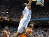 December 21, 2011: P.J. Hairston #15 dunks over Julien Lewis #2 during NCAA Basketball game between the North Carolina Tarheels and Texas Longhorns at The Dean E. Smith Center, Chapel HIll, NC.