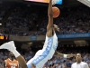 December 21, 2011: P.J. Hairston #15 dunks over Julien Lewis #2 during NCAA Basketball game between the North Carolina Tarheels and Texas Longhorns at The Dean E. Smith Center, Chapel HIll, NC.