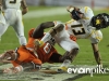January 04 2011: DeAndre Hopkins #6 tackles Andrew Buie #13 during NCAA football Discover Orange Bowl between West Virginia and Clemson at Sun Life Stadium, Miami Florida.