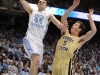 January 29th, 2012:North Carolina Tar Heels forward Tyler Zeller #44 dunks while Georgia Tech Yellow Jackets center Daniel Miller #5 watches during NCAA basketball game between the North Carolina Tar Heels and the Georgia Tech Yellow Jackets as part of Coaches Vs. Cancer, at The Dean E. Smith Center, Chapel HIll, NC.  UNC Players wore special pink Air Jordans.