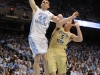 January 29th, 2012:North Carolina Tar Heels forward Tyler Zeller #44 dunks while Georgia Tech Yellow Jackets center Daniel Miller #5 watches during NCAA basketball game between the North Carolina Tar Heels and the Georgia Tech Yellow Jackets as part of Coaches Vs. Cancer, at The Dean E. Smith Center, Chapel HIll, NC.  UNC Players wore special pink Air Jordans.