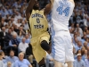 January 29th, 2012:North Carolina Tar Heels forward Tyler Zeller #44 defends Georgia Tech Yellow Jackets guard Mfon Udofia #0 during NCAA basketball game between the North Carolina Tar Heels and the Georgia Tech Yellow Jackets as part of Coaches Vs. Cancer, at The Dean E. Smith Center, Chapel HIll, NC.  UNC Players wore special pink Air Jordans.